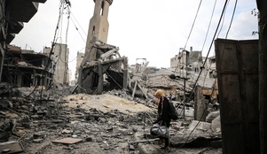 Palestinians-inspect-a-mosque-destroyed-in-Israeli-strikes-on-Gaza-Citys-Shati-refugee-camp-early-on-October-9-2023.